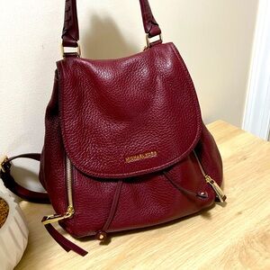 Like New! Beautiful Michael Kors leather backpack, rich maroon pebbled leather